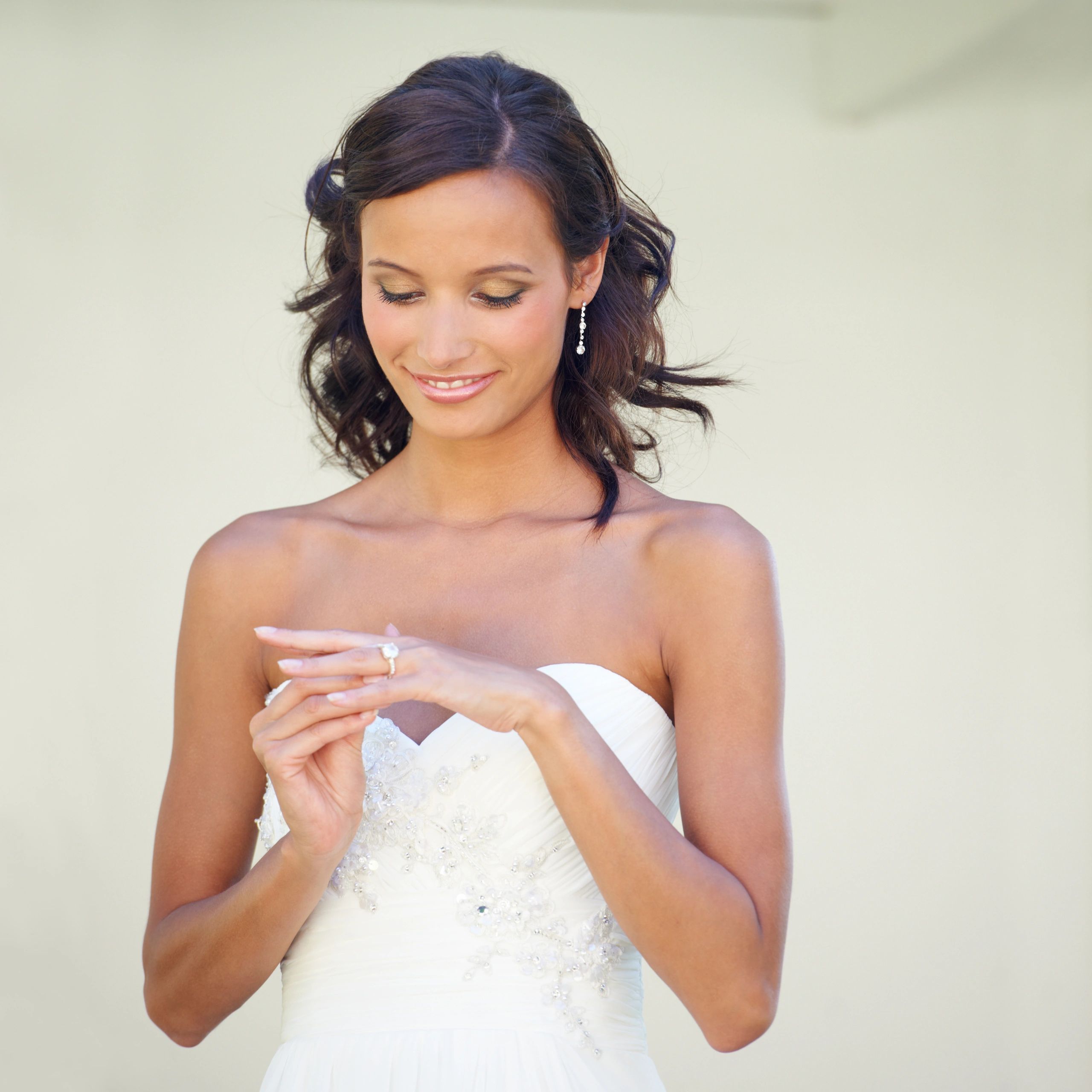 Bride admiring her wedding ring